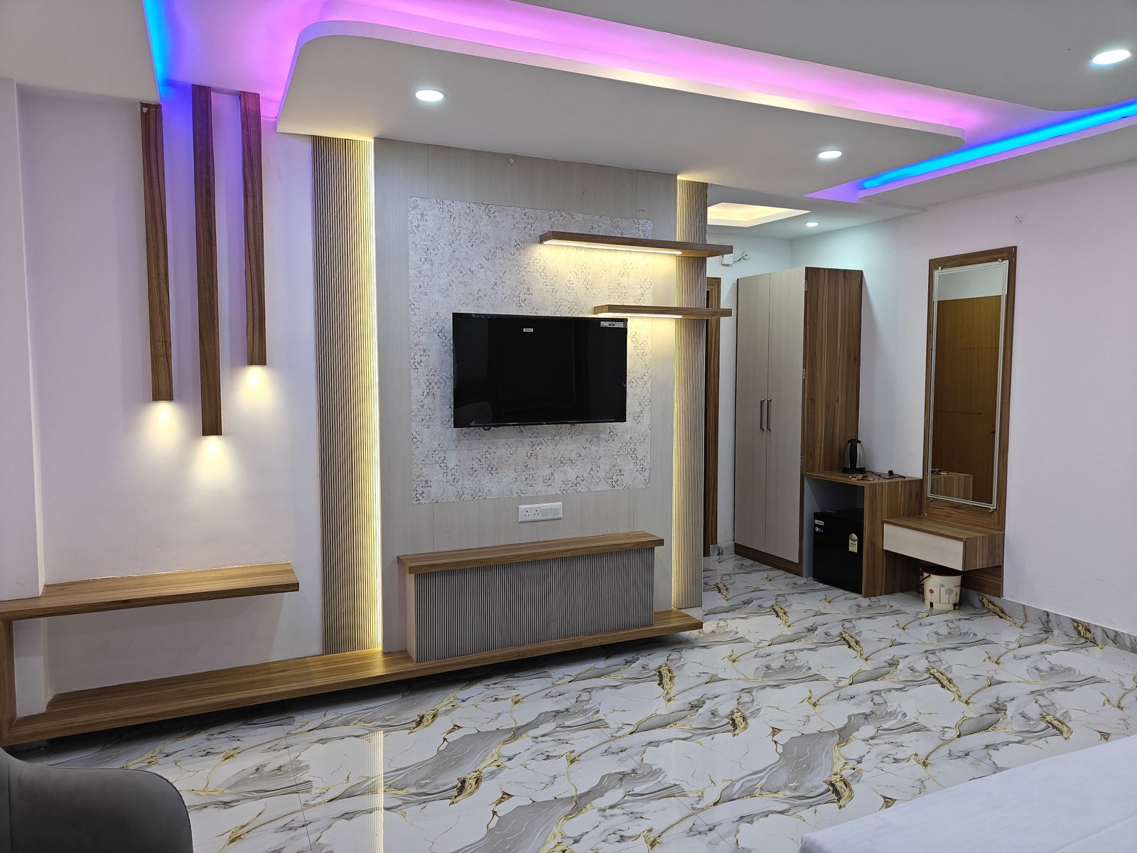Deluxe Room with LED ceiling at Maa Sharda Shakti Hotel